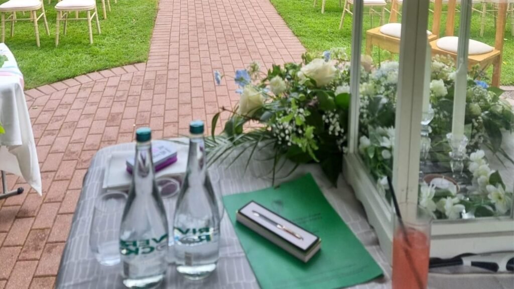 Legal outdoor wedding ceremony in Ireland with Marriage Registration Form on signing table